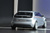 Coupe-like body houses a plug-in hybrid system good for 21 miles on batteries alone